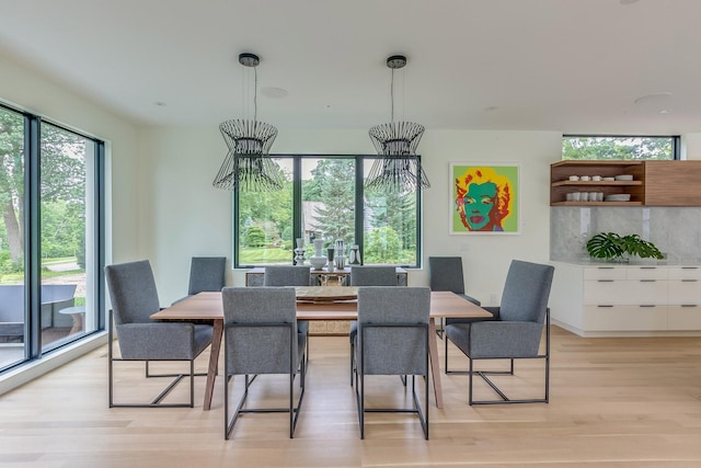 dining area with light wood-type flooring