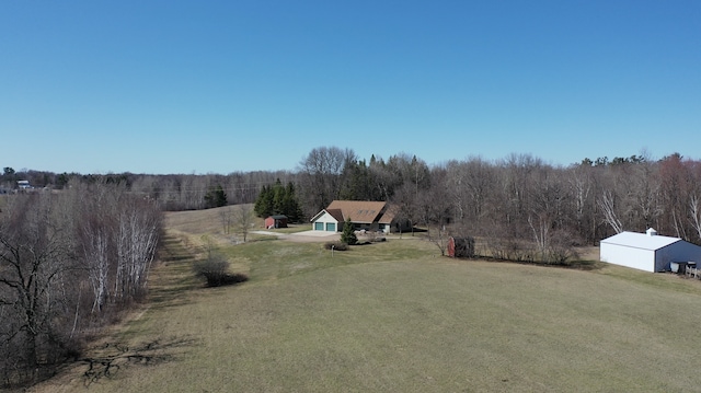 view of yard with a rural view