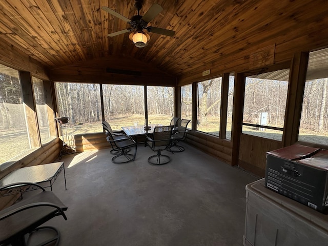 sunroom featuring wooden ceiling, vaulted ceiling, and ceiling fan