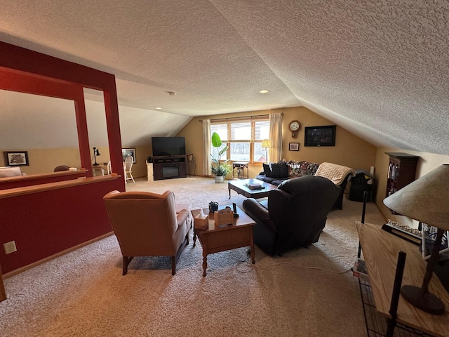 carpeted living room featuring a textured ceiling and lofted ceiling