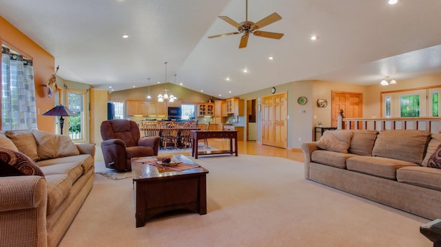 carpeted living room with lofted ceiling and ceiling fan