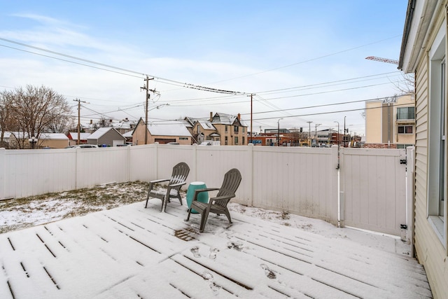 view of snow covered deck