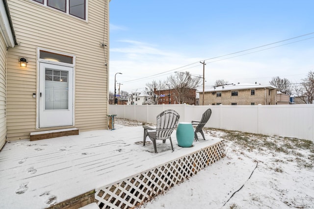 view of snow covered deck