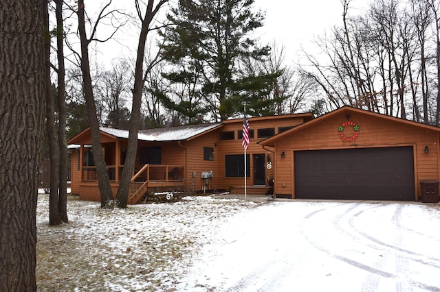 ranch-style home featuring a garage