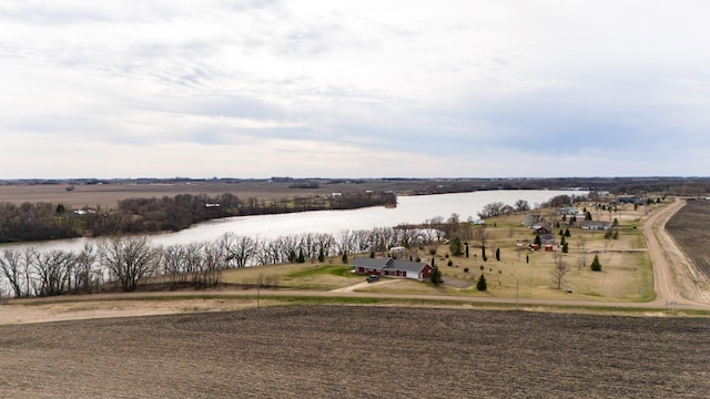 aerial view with a water view and a rural view