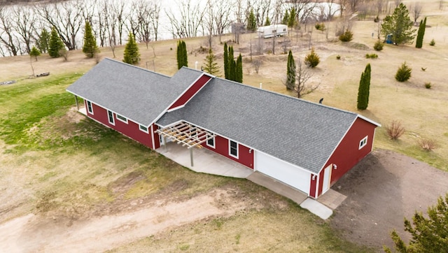 birds eye view of property featuring a rural view