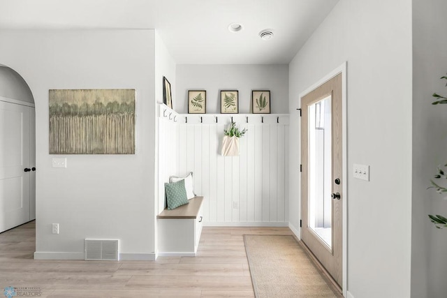 mudroom with plenty of natural light and light wood-type flooring