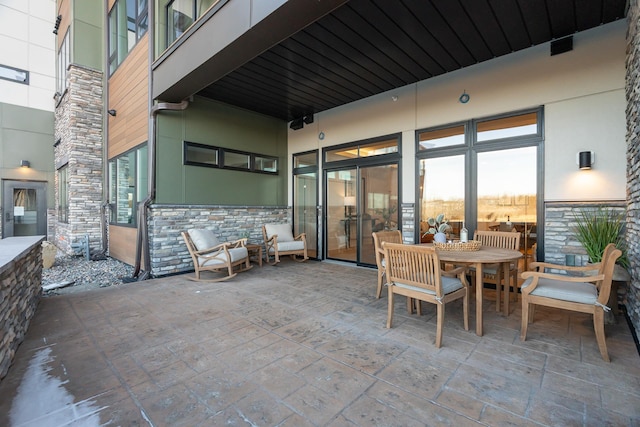 1 Hill Farm Rd Unit 107, North Oaks, MN 55127 - view of patio featuring outdoor dining area