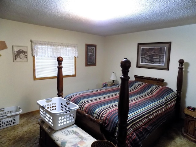 carpeted bedroom featuring a textured ceiling