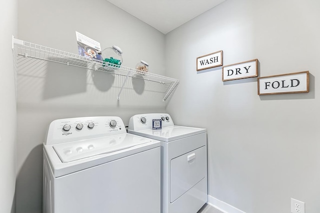 washroom featuring independent washer and dryer