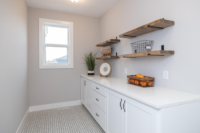 interior space with light tile floors