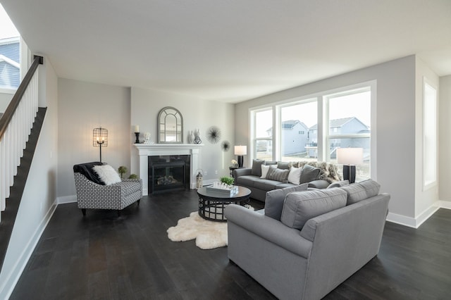 living room featuring dark wood-type flooring