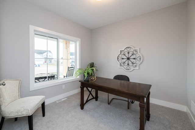 view of carpeted home office