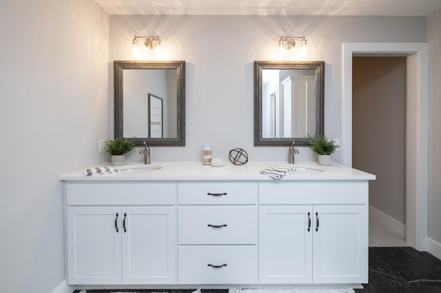 bathroom featuring dual bowl vanity and tile flooring