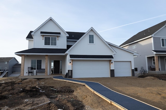 view of front of property with a garage