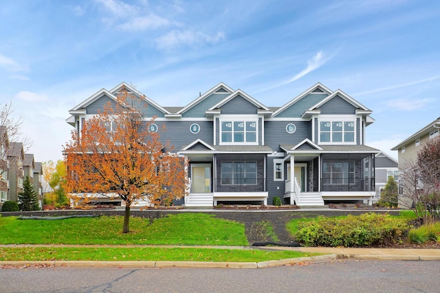 view of front of home with a front yard