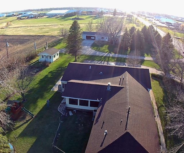 birds eye view of property with a rural view