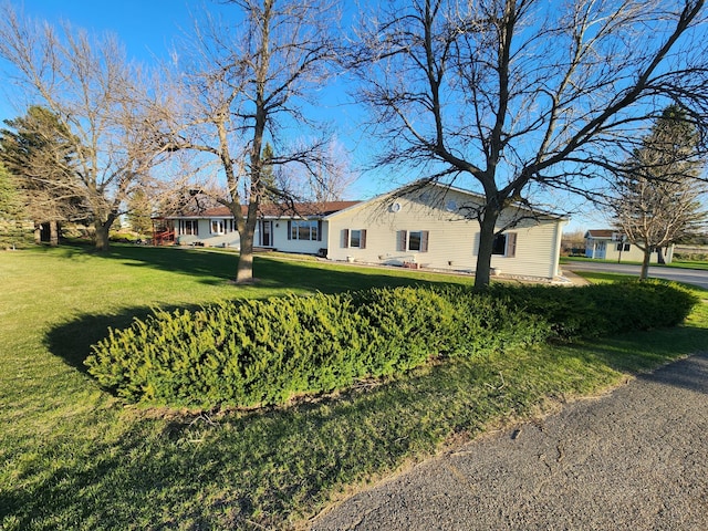 view of front of home with a front lawn