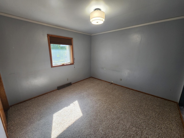 unfurnished room featuring carpet flooring and crown molding