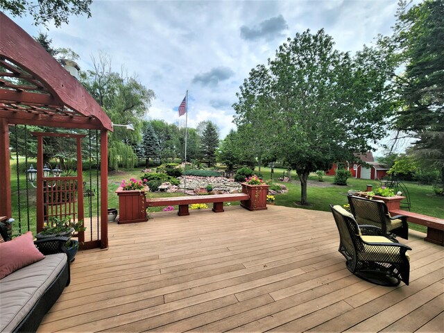 deck featuring a lawn