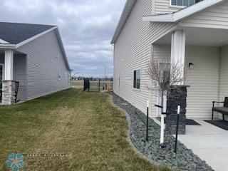 view of home's exterior featuring a yard