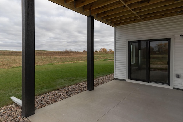 view of patio with a rural view