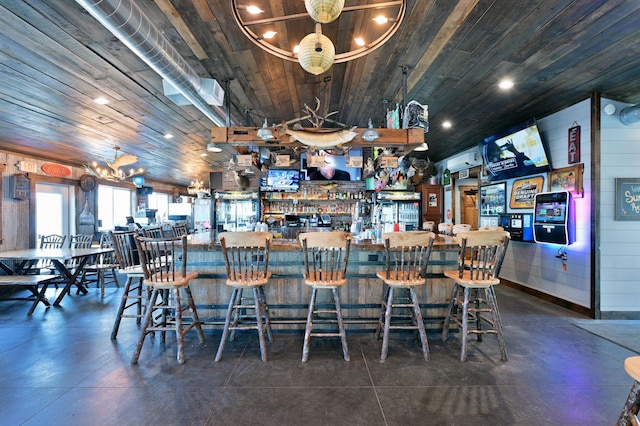 bar with wooden ceiling and a chandelier