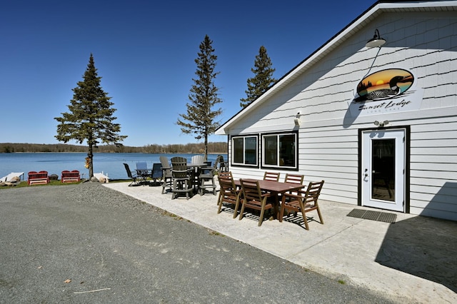 view of patio / terrace featuring a water view