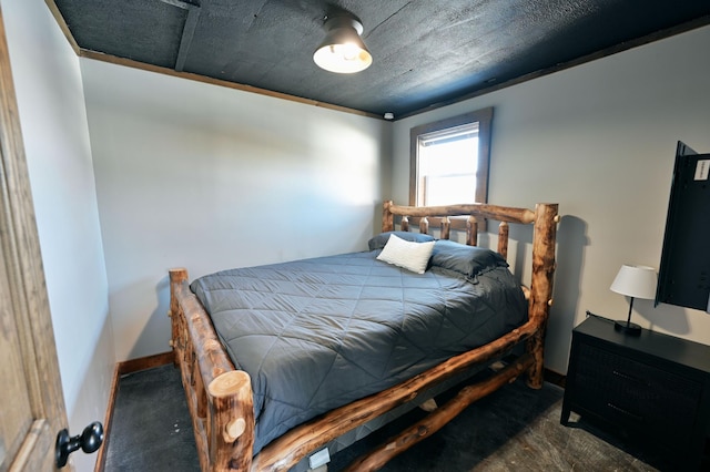 bedroom with dark carpet