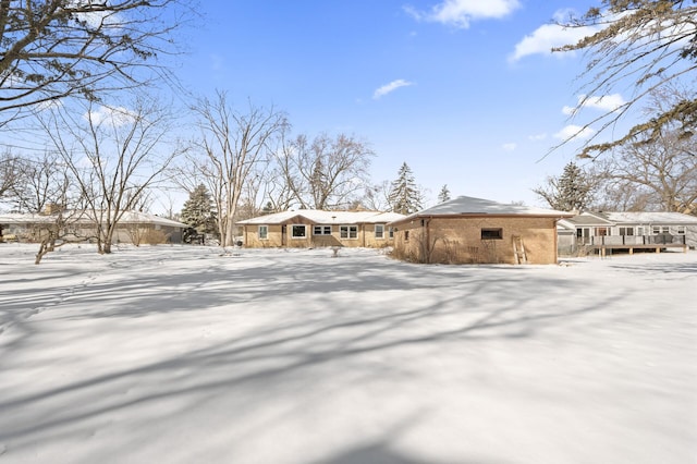 view of snow covered property