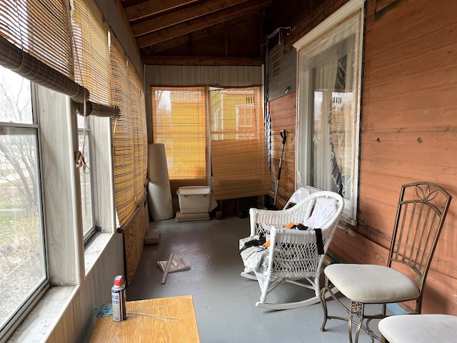 sunroom with lofted ceiling