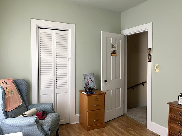 sitting room with light wood-type flooring