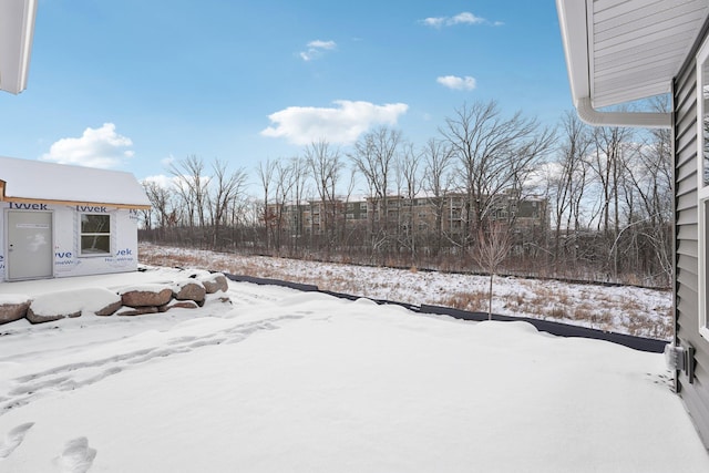 view of snowy yard