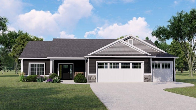 craftsman-style home featuring a front yard and a garage