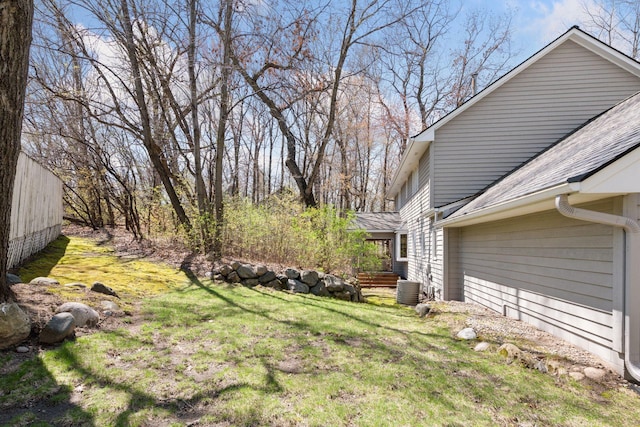 view of yard with central AC