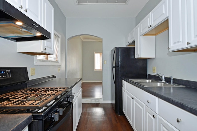 kitchen with white cabinetry, sink, dark wood-type flooring, and black gas range