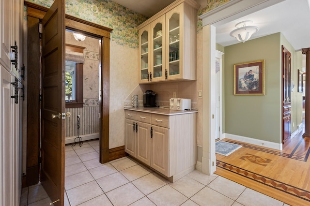 kitchen featuring light brown cabinets and light wood-type flooring