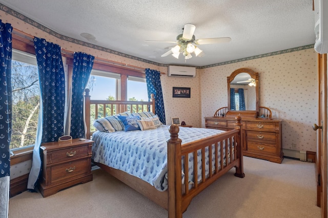 bedroom with multiple windows, ceiling fan, an AC wall unit, and a baseboard heating unit