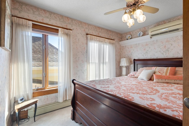 bedroom featuring light carpet, ceiling fan, a wall mounted air conditioner, and a textured ceiling