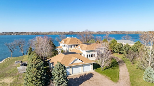 bird's eye view with a water view
