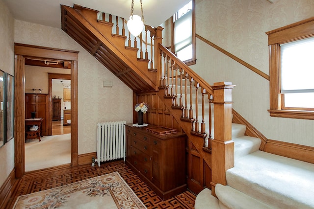 staircase with radiator