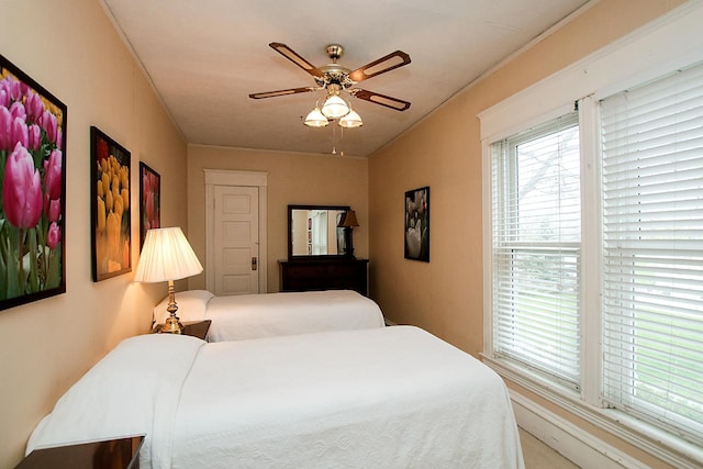 bedroom featuring ceiling fan