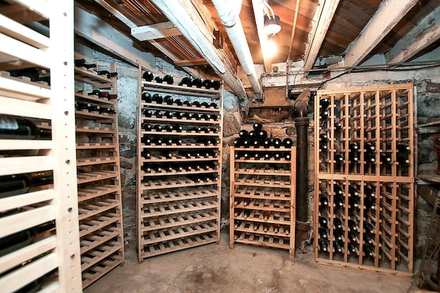 wine cellar featuring concrete floors