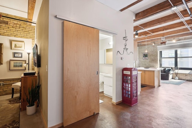 hallway with brick wall