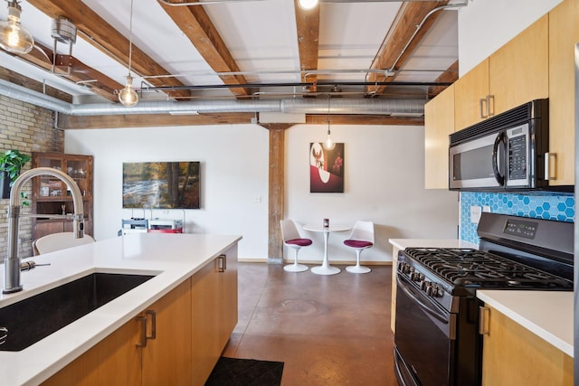 kitchen with beam ceiling, hanging light fixtures, black gas range, backsplash, and sink