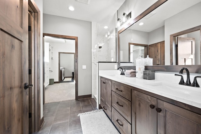 bathroom with vanity and tile patterned floors