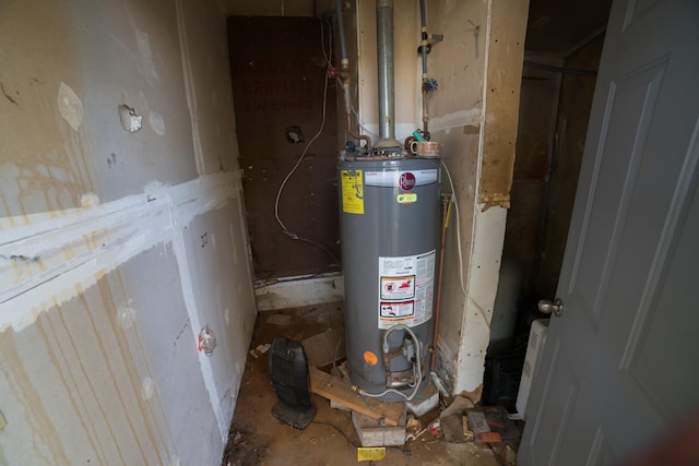 utility room with water heater