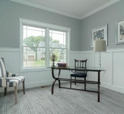 home office featuring crown molding and a wealth of natural light