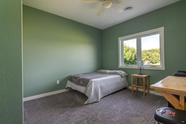 bedroom featuring ceiling fan, carpet floors, visible vents, and baseboards