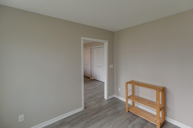 spare room with light hardwood / wood-style floors